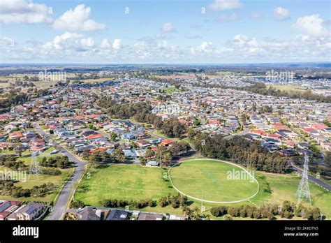 Drone aerial photograph of houses and roads in the suburb of Glenmore ...