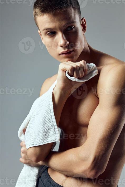 Sporty Man On Naked Body With Towel In Hands Close Up Isolated Background 22059845 Stock Photo
