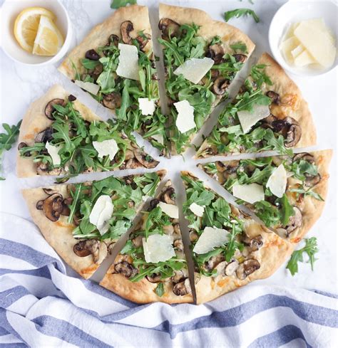 Arugula And Mushroom Pizza With Truffle Oil Pina Bresciani