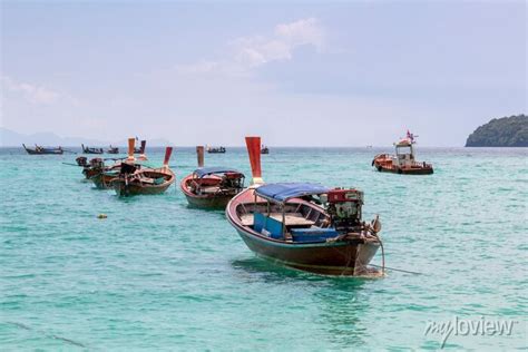 Thai Traditional Wooden Long Tail Boat And Beautiful Sand Beach