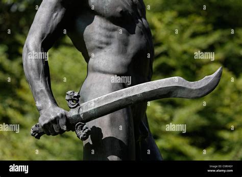 Naked Man Holding A Sword Perseus Bronze Sculpture Lantz Scher Park Duesseldorf Lohausen