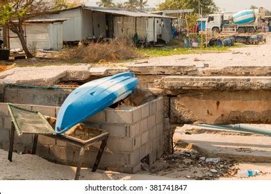 Construction Worker Vibrating Cement On Construction Stock Photo