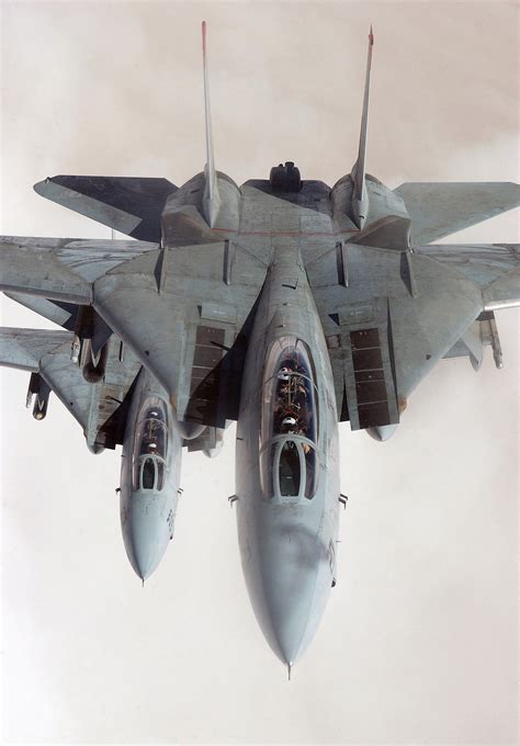 Two Us Navy Usn F 14d Tomcat Aircraft In Flight In Stacked Formation