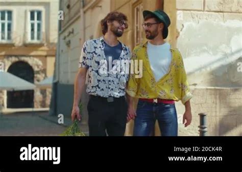 Happy Two Gay Men Walking Look To Each Other In Eyes Holding Hands Homosexual Couple Dating Lgbt