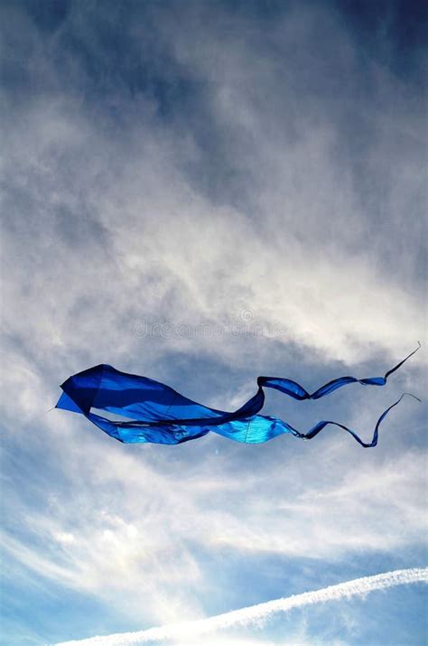 A large kite of blue color stock photo. Image of wind - 101544222