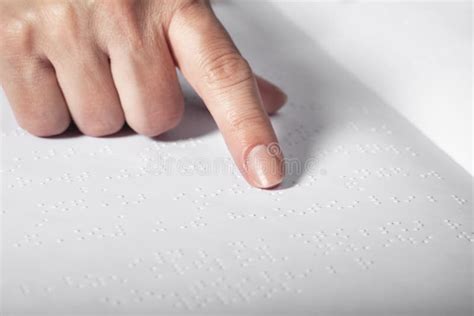 Hand Of A Blind Person Reading Some Braille Text Stock Photo Image