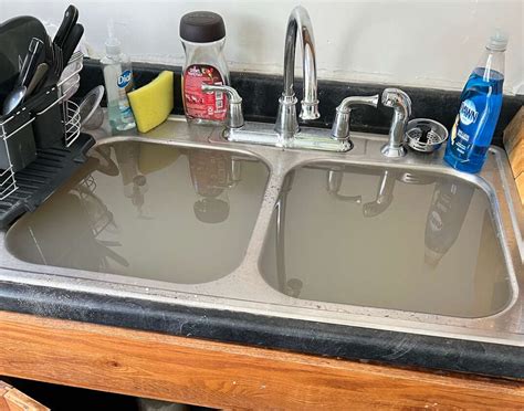 Why Does Kitchen Sink Back Up Top Causes And Quick Fixes