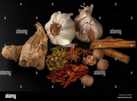 Set Of Asian Spices Cardamon Seeds Garlic Anise Stars Nutmeg