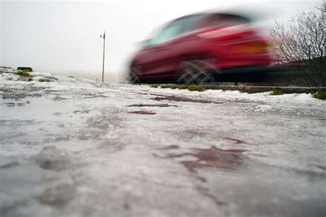 UK weather: Ice warning issued as flooding brings travel disruption in ...