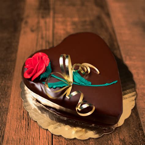 Our snowflake cake will leave a smile... - Merritt's Bakery