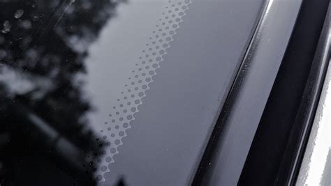 Why Your Car S Windshield Has Those Mysterious Black Dots