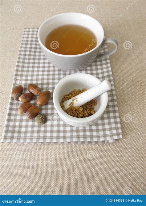Acorn Coffee from Roasted Acorns Crushed in a Mortar Stock Photo
