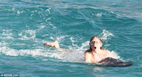 Lily Cole Almost Reveals Too Much After Losing Her Bikini Top While