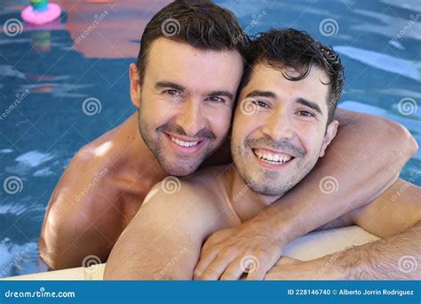 Gorgeous Interracial Gay Couple In Swimming Pool Stock Photo Image Of