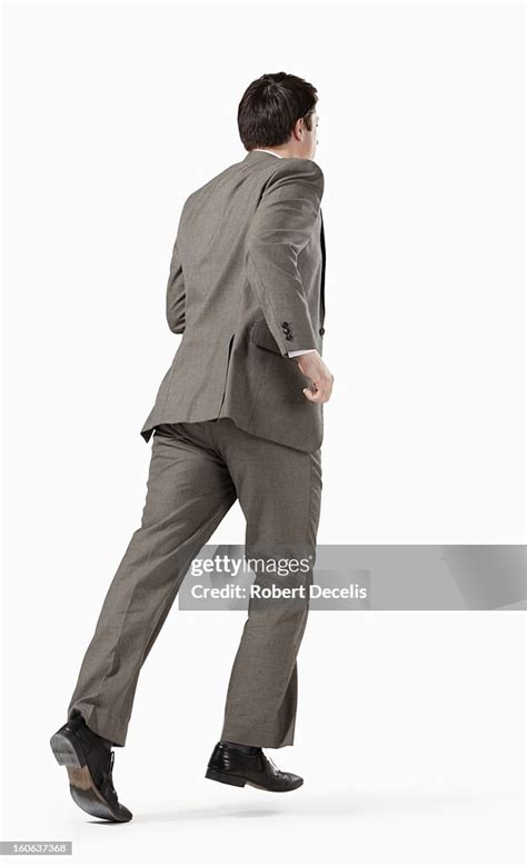 Business Man Running Away From Camera High Res Stock Photo Getty Images