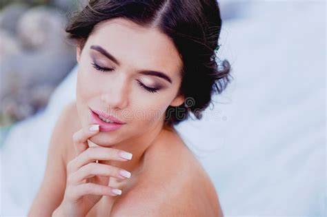 Brunette With Closed Eyes Touches Her Lips Stock Photo Image Of Beauty Curled 74611964