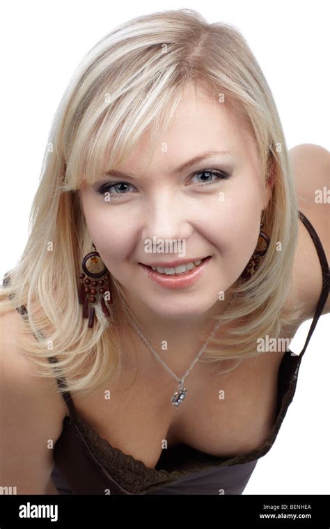 Close Up Portrait Of Beautiful Blonde Girl Inclining Forward And Smiling Stock Photo Alamy