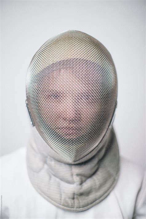 Close Up Of Female Fencer In Mask By Stocksy Contributor Danil