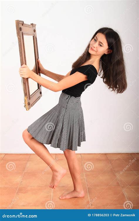 Smiling Brunette Girl Watching Herself In Mirror Stock Image Image Of Barefooted Nice