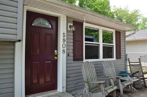 Stunning Tan House With Maroon Shutters A Jaw Dropping Curb Appeal Transformation