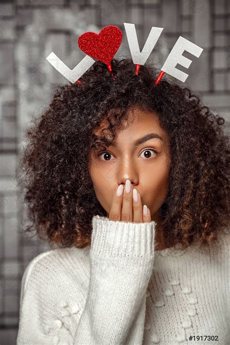 Close Up Portrait Of A Young Curly Haired African American Stock