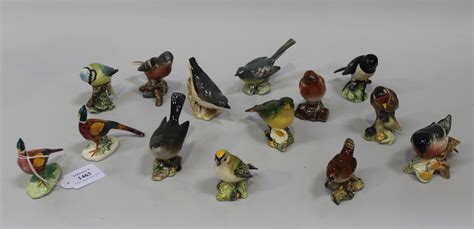 A collection of fourteen Beswick birds, comprising two pheasants, Nos ...