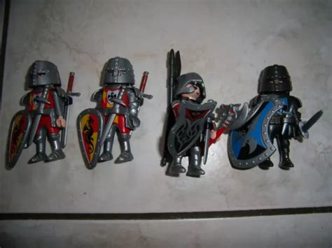 PLAYMOBIL LOT DE 4 CHEVALIERS DU DRAGON NOIR ARMES très bon état