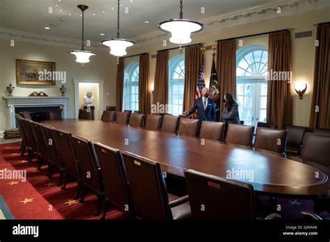 President Joe Biden gives a tour of the Cabinet Room to historian ...