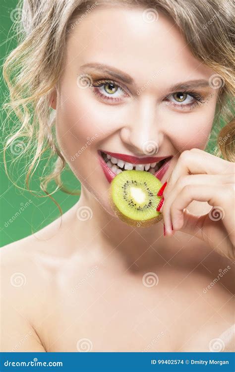 Fruit Kiwi Series Closeup Of Sensual And Naked Caucasian Model With Teeth Diastema Posing With