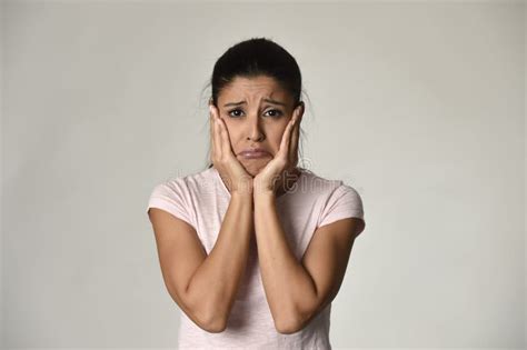 Young Beautiful Hispanic Sad Woman Serious And Concerned In Worried