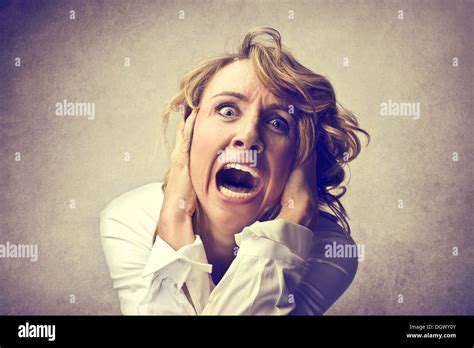 Portrait Of A Desperate Blonde Woman Screaming Stock Photo Alamy