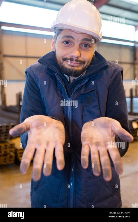 Worker Showing His Dirty Hands Stock Photo Alamy