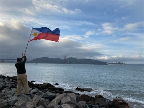 Consul General Henry S Bensurto Jr Waves The Philippine Flag As The