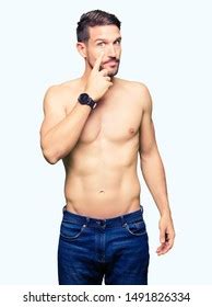 Handsome Shirtless Man Showing Nude Chest Stock Photo