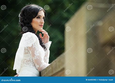 Stylish Innocent Brunette Bride In White Dress Posing On Old Balcony Stock Image Image Of