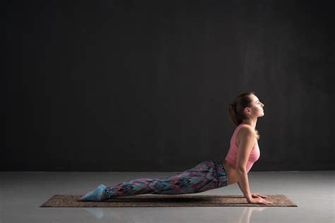 Premium Photo Woman Practicing Yoga Doing Urdhva Mukha Svanasana