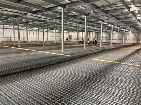 Robotics On A Mezzanine Floor Work With Concrete Almacon