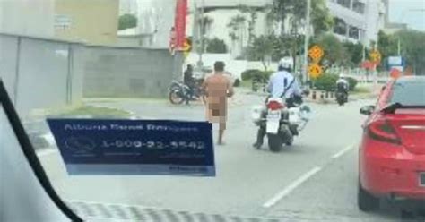 Drunken Man Wanders Kl Naked Cops Buy Him Clothes Give Him Bus Fare Home New Straits Times