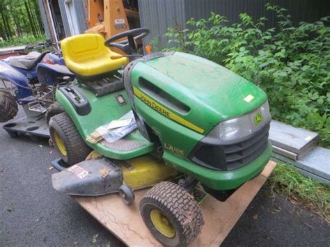 John Deere La 105 Riding Lawn Mower See Details Lambrecht Auction Inc