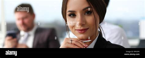 Beautiful Smiling Brunette Clerk Girl At Workplace Stock Photo Alamy