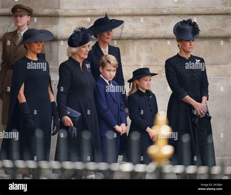 (left to right) The Duchess of Sussex, the Queen Consort, the Princess