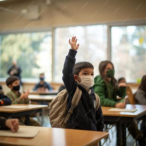 Premium Photo | Boy waves to teacher and classmates during a zoom class