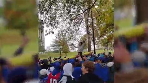 12-year-old rides goalpost carried by fans following KU's historic win