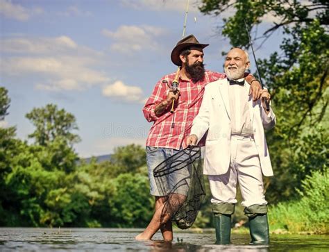 Gone Fishing Fly Fishing Adventures Retired Father And Mature Son With Beard Stock Image