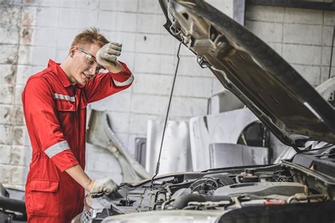 Premium Photo Tired Exhausted Mechanic Male Staff Fatigue Worker Work In Hot Workplace Car