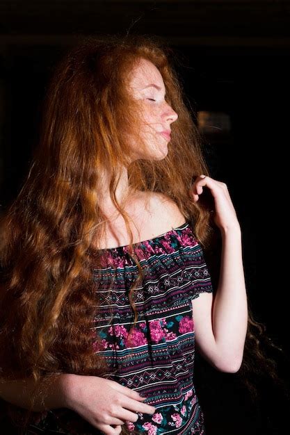 Premium Photo Pretty Red Haired Model With Lush Curly Hair And Naked Shoulders