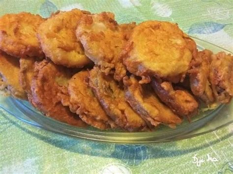 Some Fried Food Is Sitting On A Glass Platter And Ready To Be Eaten For