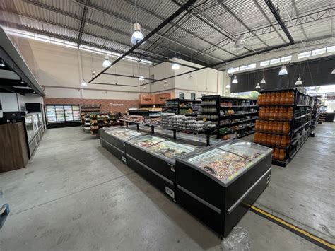 An Empty Grocery Store Filled With Lots Of Food