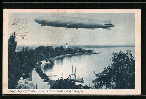 AK Friedrichshafen Bodensee LZ127 Graf Zeppelin über der Stadt