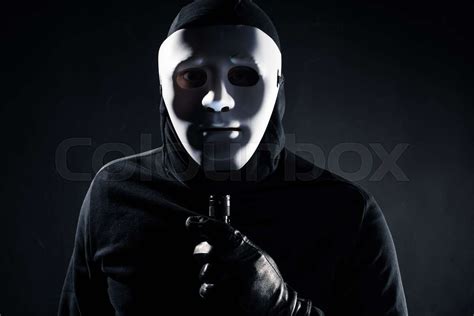 robber  white mask holding flashlight stock image colourbox